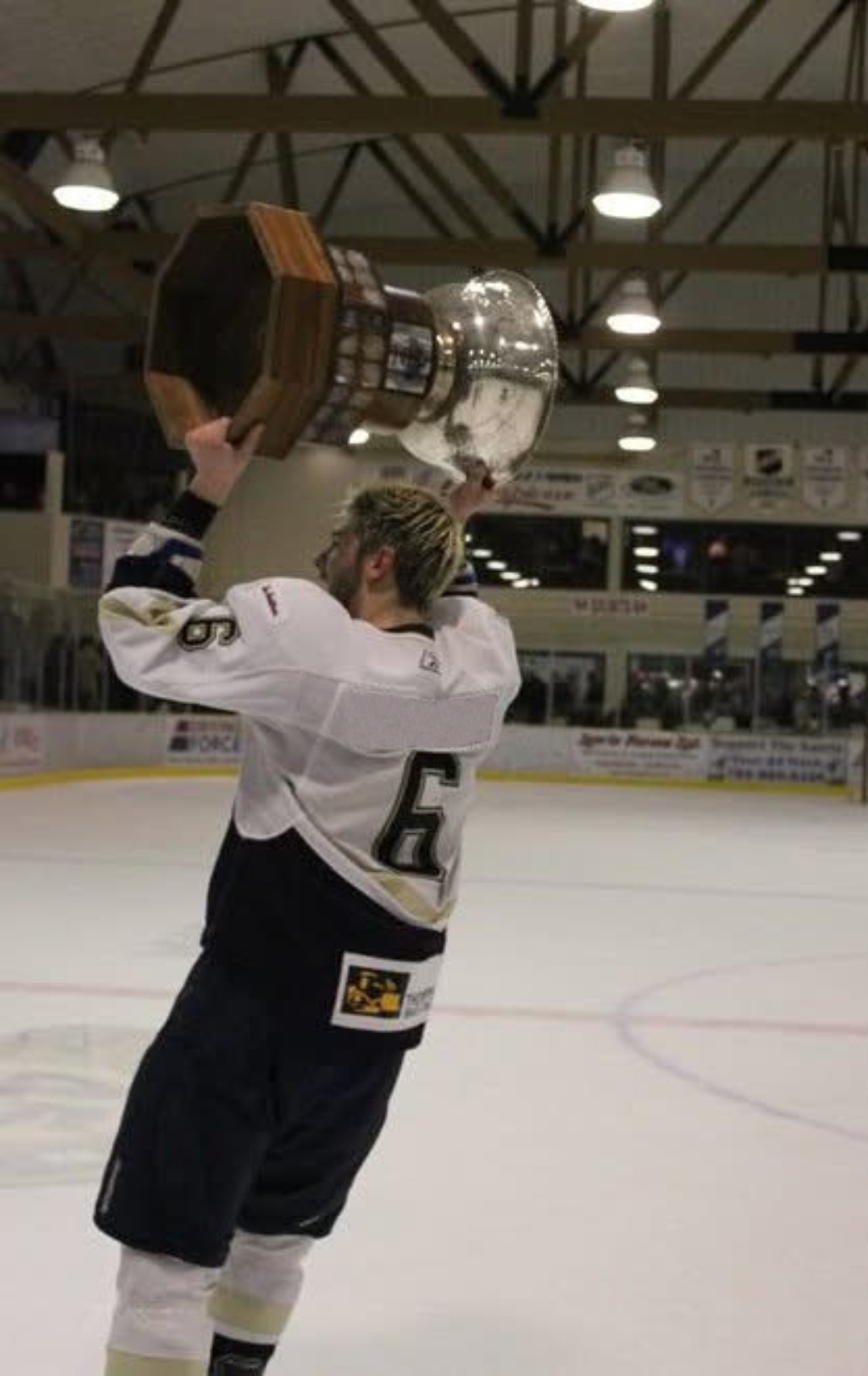 Player skillfully dribbles past defenders on glossy turf